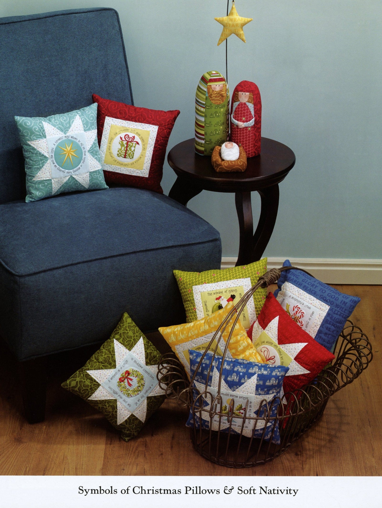 Interior page of the Christmas Pure And Simple quilt pattern book by Nancy Halvorsen of Art to Heart, showing Symbols of Christmas star pillows and the Soft Nativity figures.