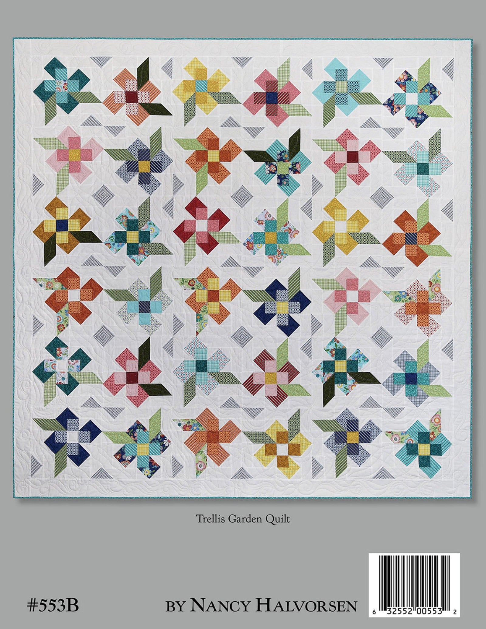 Back cover of the Home Grown quilt pattern book by Nancy Halvorsen of Art to Heart, showing the Trellis Garden Quilt, a scrappy pieced quilt of floral and pinwheel blocks in soft multicolor prints on a light background. Marked number 553B by Nancy Halvorsen.