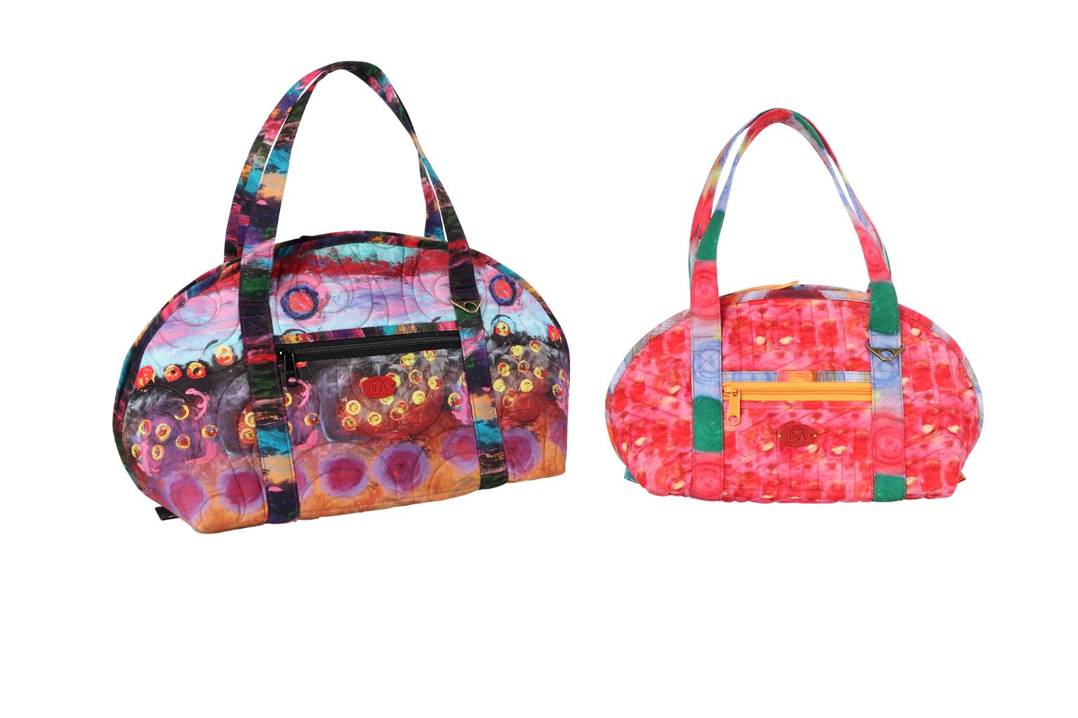 Two Hot and Heavy bags showing the front zippered slip pocket.