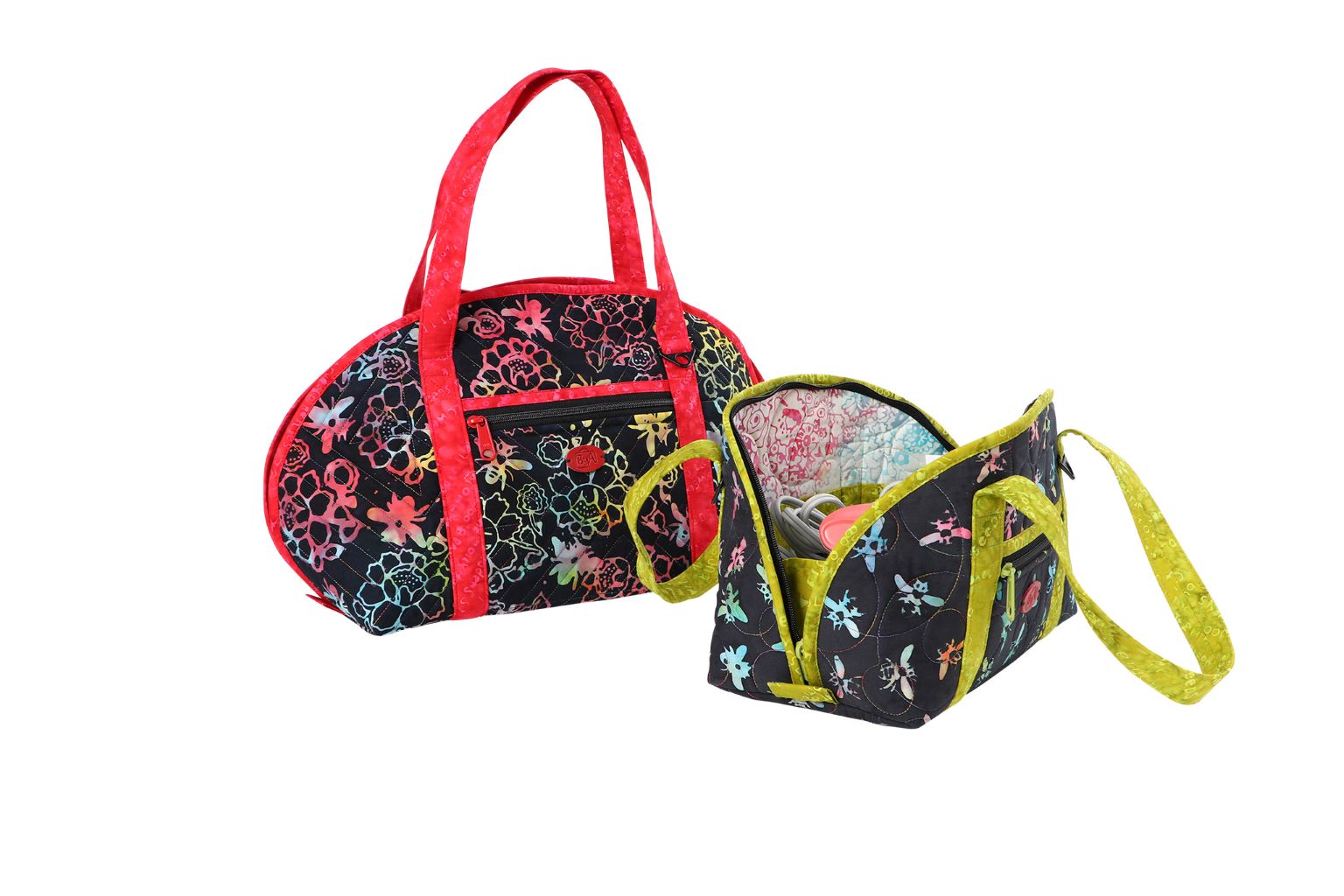 A Hot and Heavy bag opened wide with a separate shoulder strap attached to the handle rings.