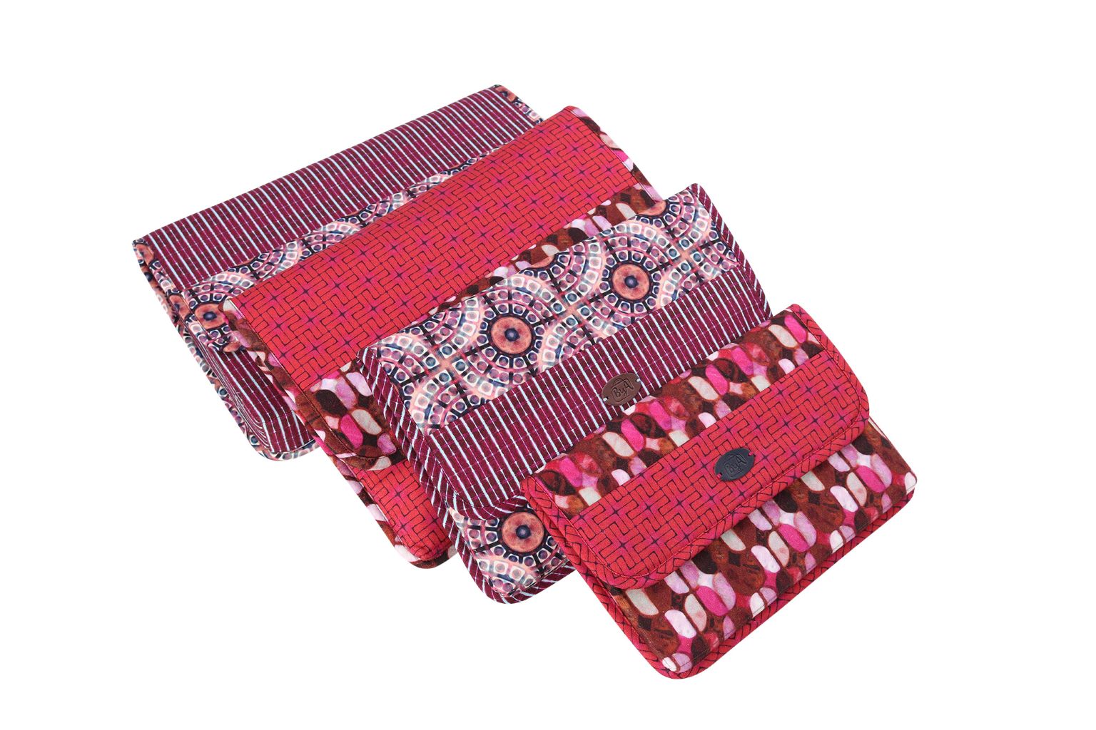 Four iCases cases in red, striped, and floral prints stacked by size, showing the flap closures.