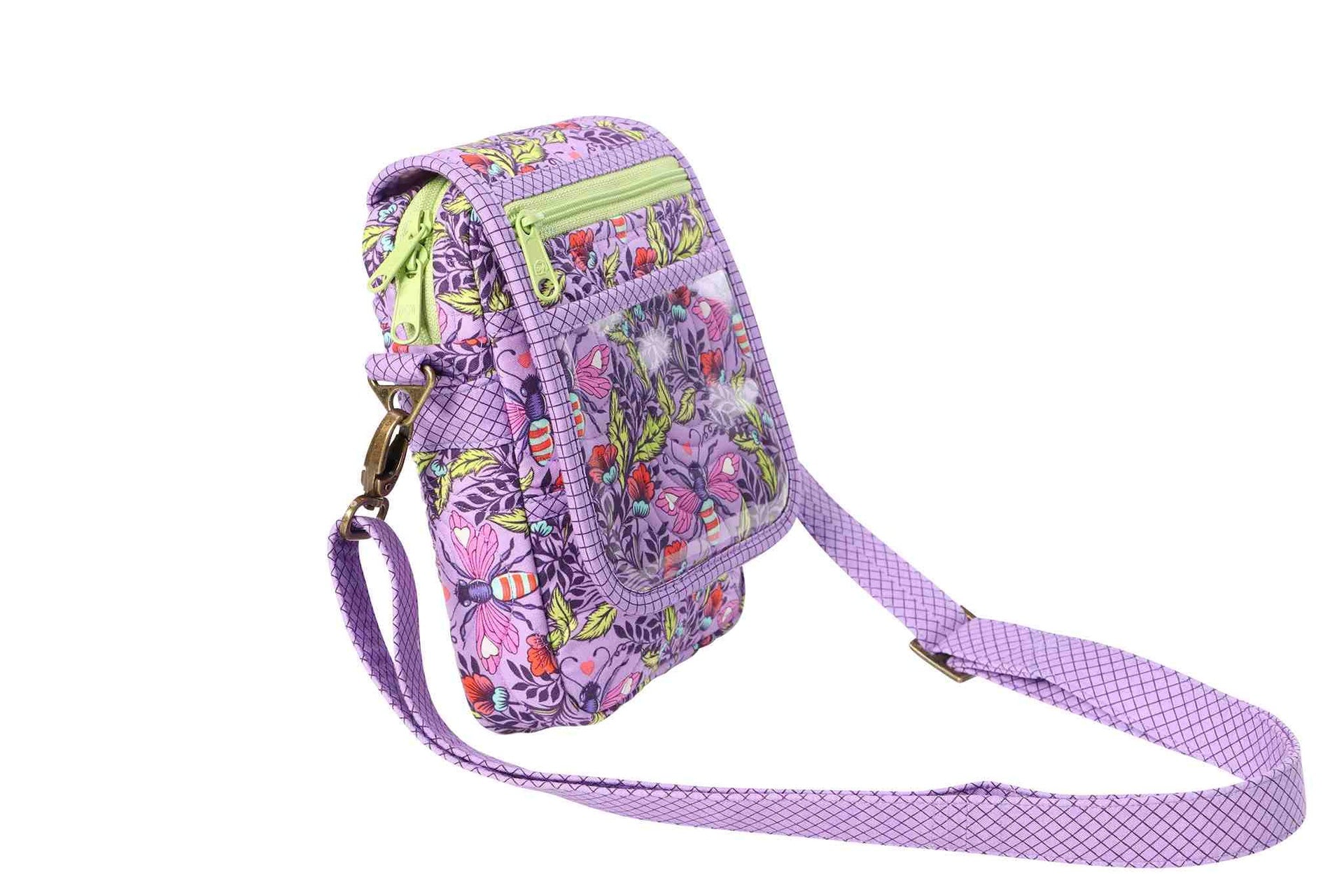 An On the Go bag in a purple print shown from the back, showing the deep zippered back pocket and the adjustable strap.