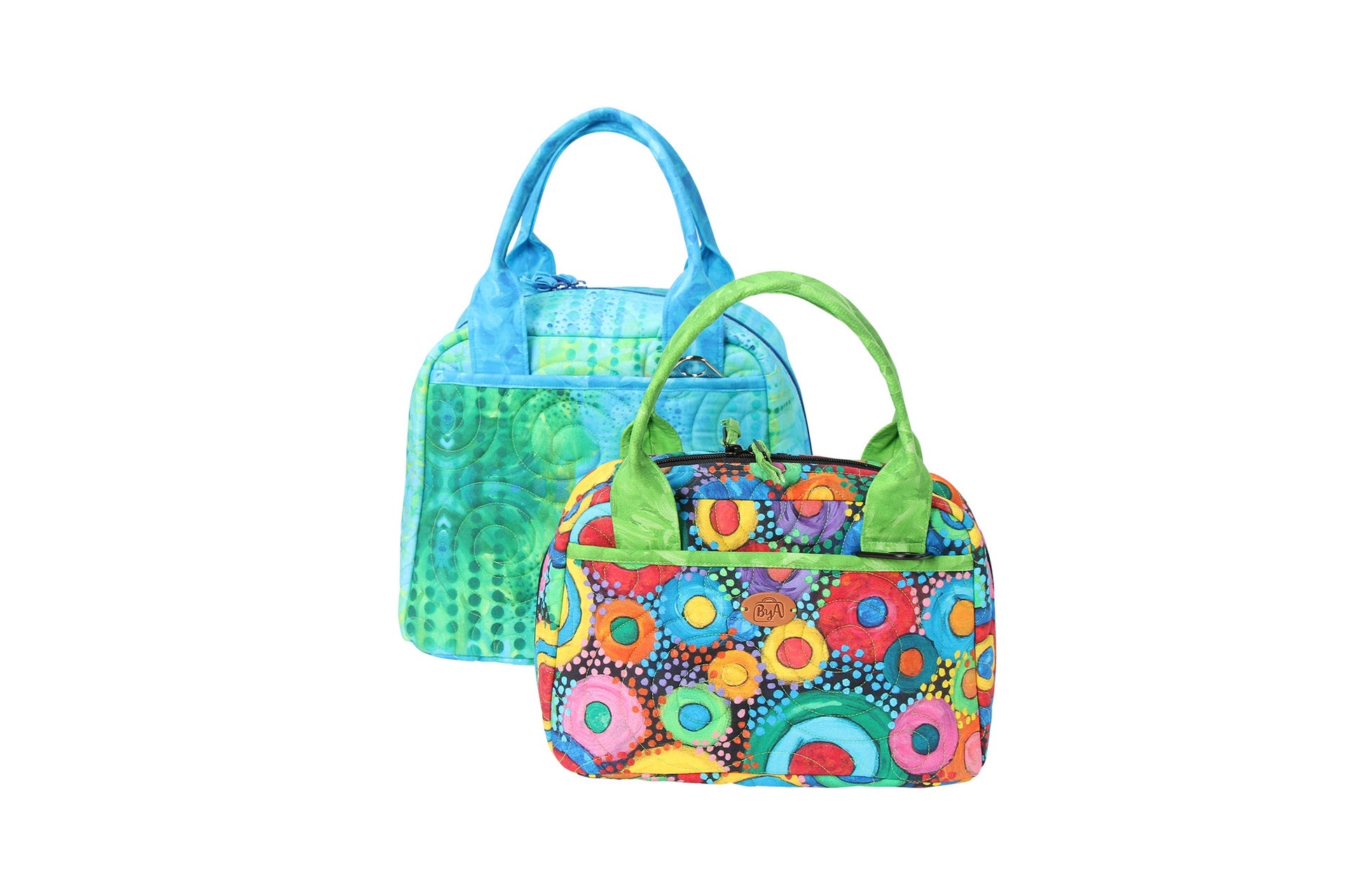 Two Out to Lunch bags in a blue and a floral dot print, shown side by side in the small and large sizes.