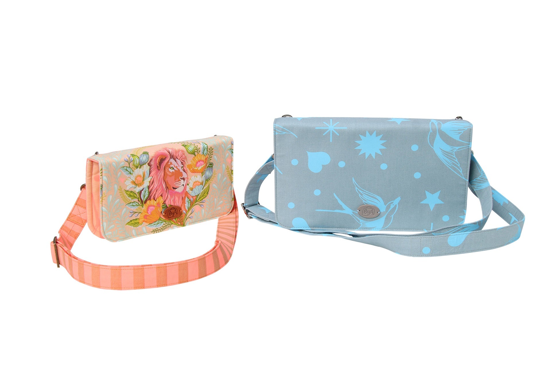 Two Payday wallets, one floral and one light blue, with crossbody straps, shown from the front.