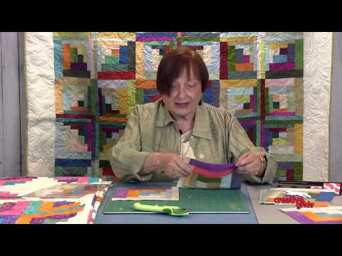 Creative Grids Curvy Log Cabin Trim Tool 8-Inch Finished Blocks CGRJAW5 by Jean Ann Wright, the official CreativeGridsUSA demonstration video.