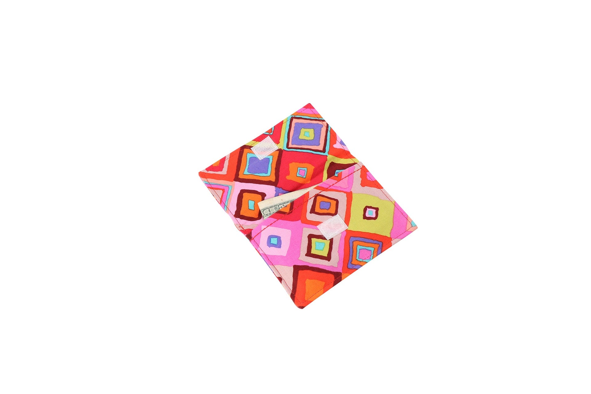A Sew Simple Wallet in a bright diamond print shown open flat, showing the single fabric body.