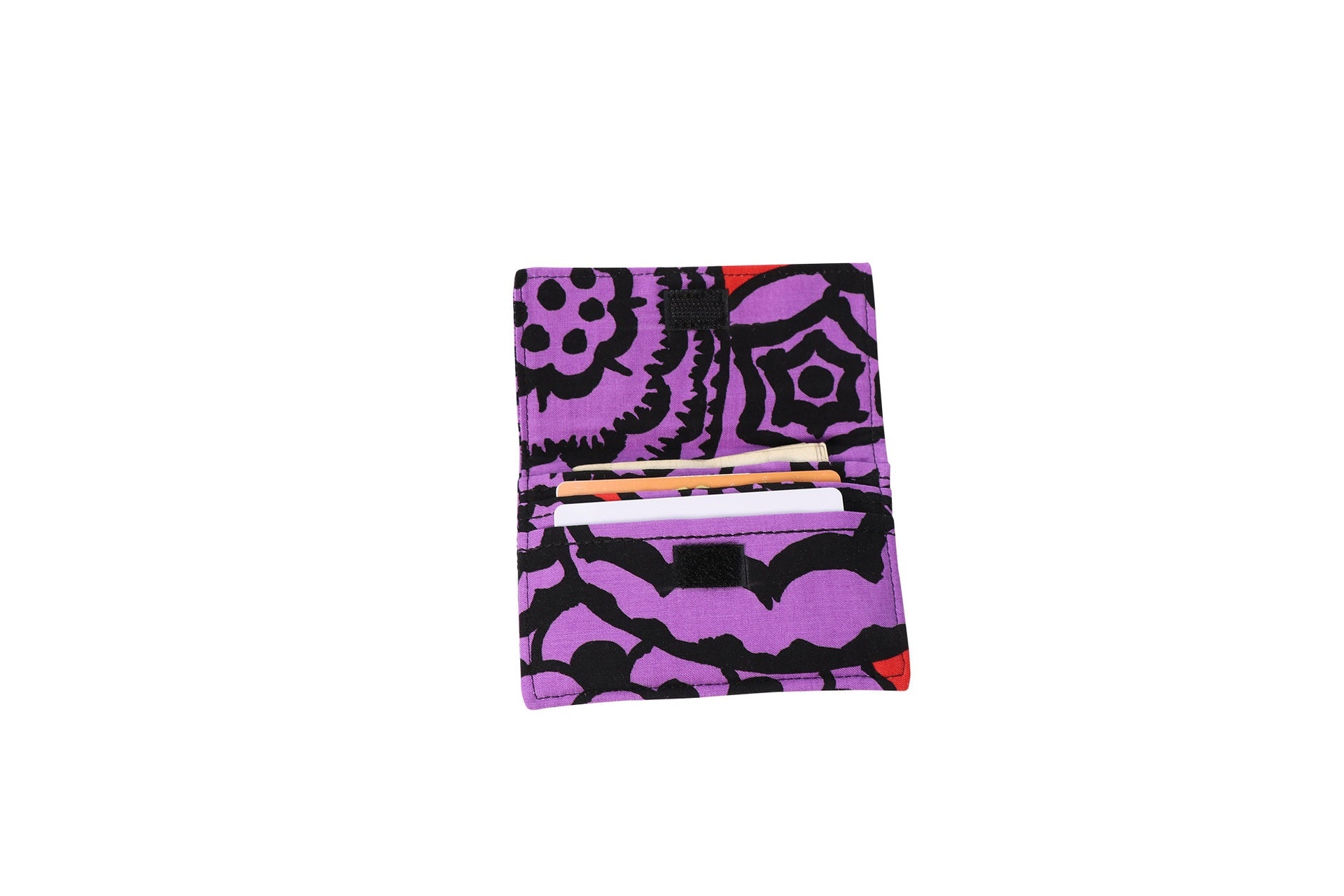 A purple Sew Simple Wallet shown folded closed with the flap secured.