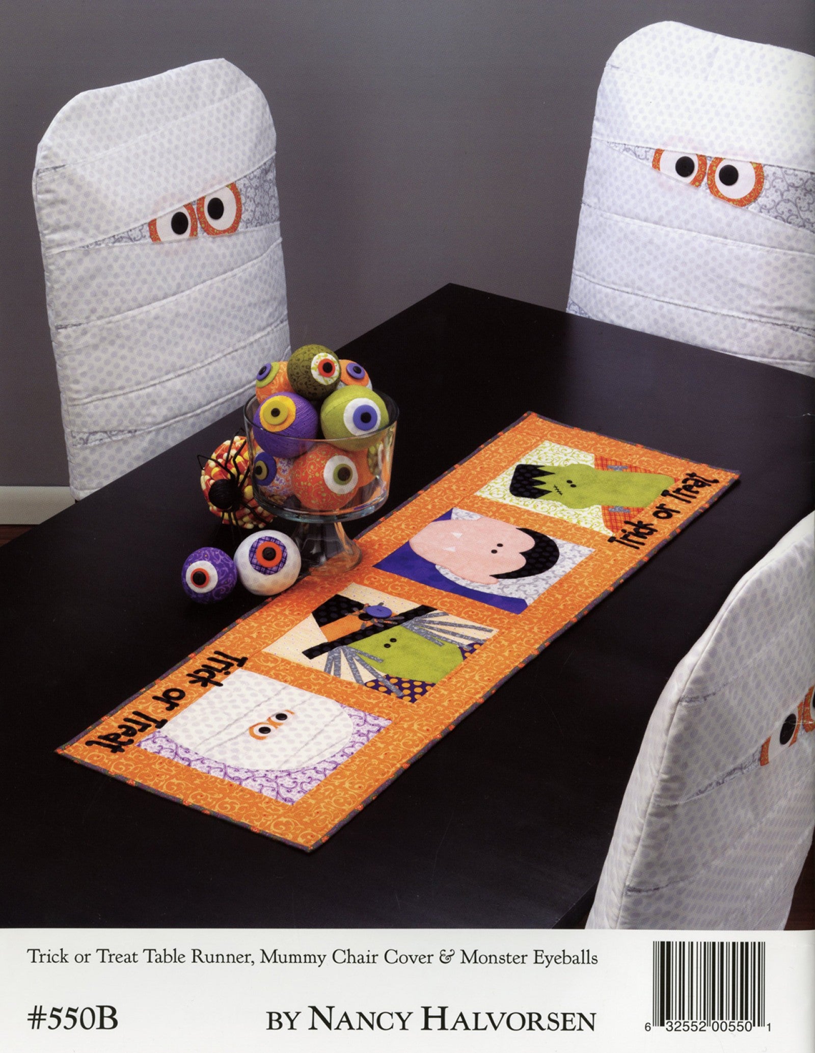 Back cover of the Table Please Part Two quilt pattern book by Nancy Halvorsen of Art to Heart, showing the Trick or Treat table runner, Mummy chair cover, and Monster Eyeballs. Marked number 550B by Nancy Halvorsen.