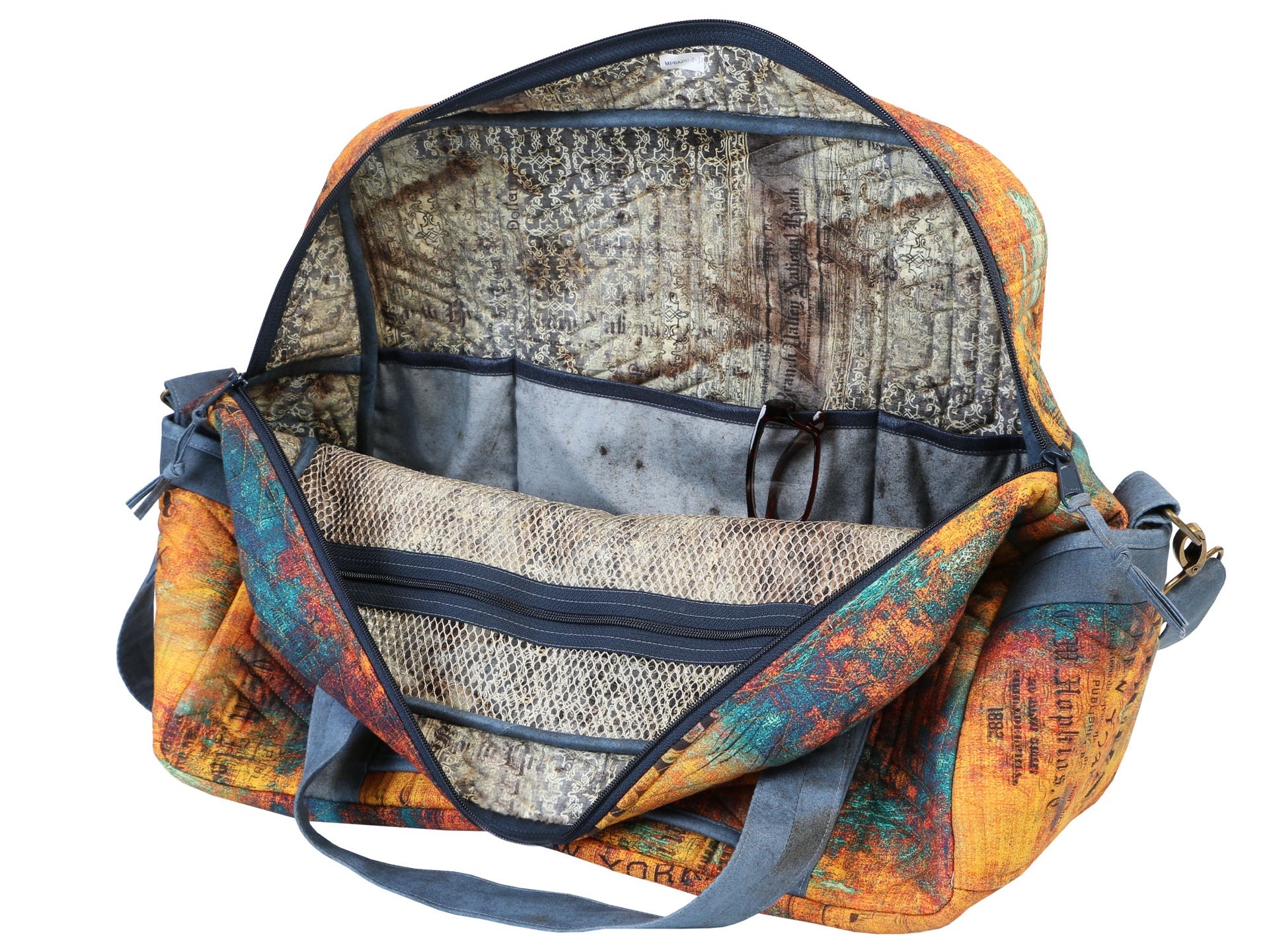 An orange Ultimate Travel Bag opened wide to show the mesh interior pockets and lining.